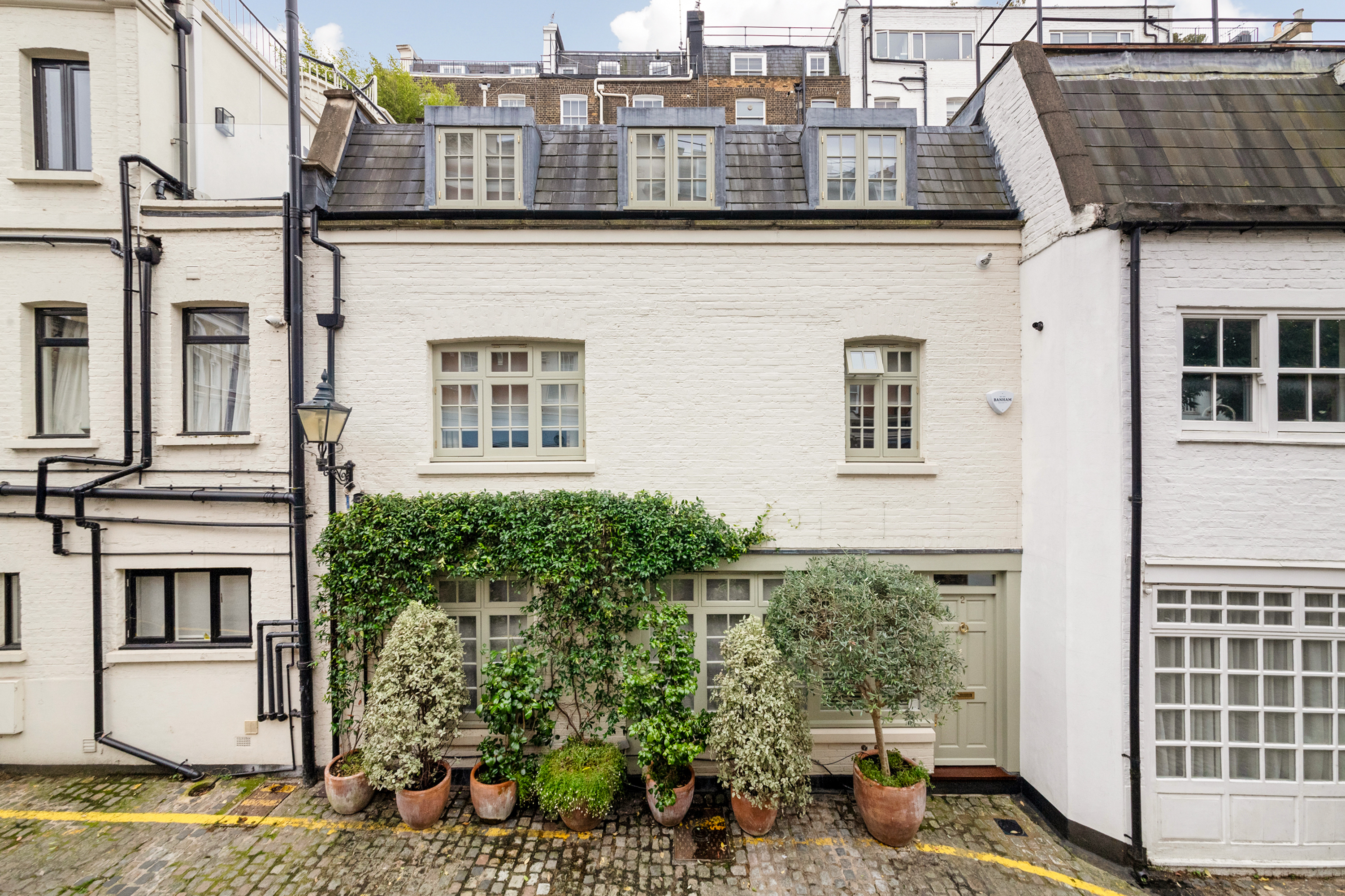 This is a mews property for sale with Lurot Brand in South Kensington