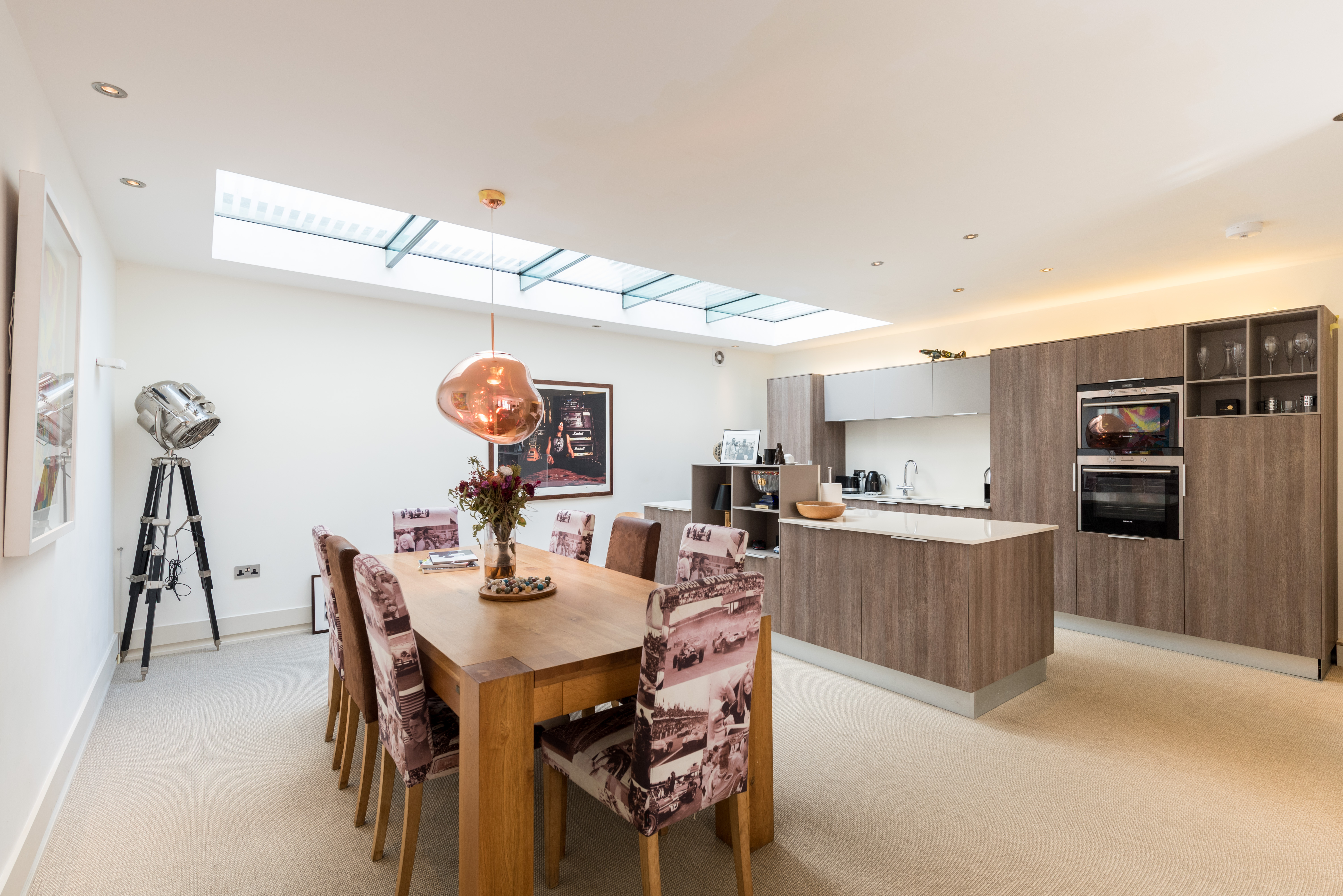 This property to rent offers an open plan kitchen with a quirky interior design