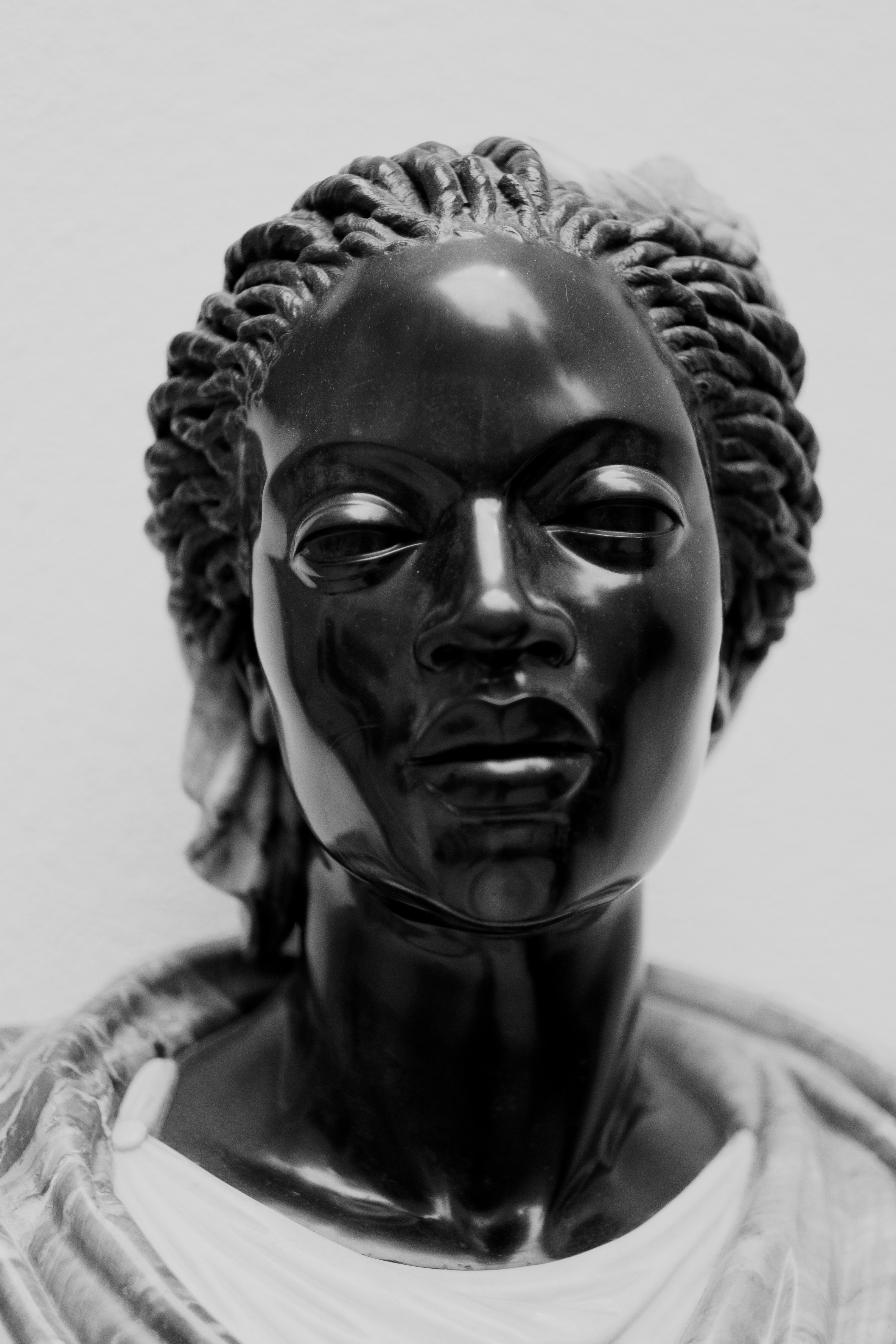 Bust Of An African Woman Rendered In Black Marble, White Marble, And Jasper. Perhaps Made In Italy, In The 17Th Or 18Th Centuries.